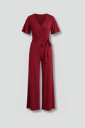 Damesjumpsuit – Dames Jumpsuit met Overslag en Strikceintuur – vooraanzicht | Pancreitis