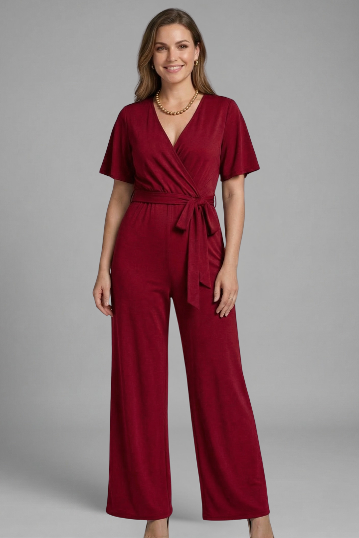 Damesjumpsuit – Dames Jumpsuit met Overslag en Strikceintuur – zijaanzicht | Pancreitis