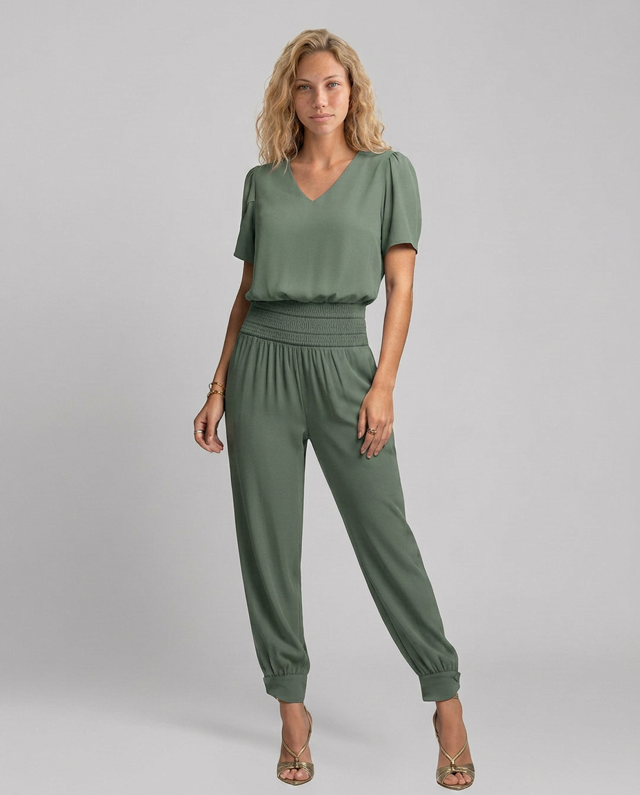 Erma V-Neck Jumpsuit met elastische taille in zwart, groen, blauw en geel. 4