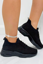 Kristallen Comfort Flexi Sneakers in zwart voor stijlvolle en comfortabele stappen.