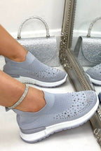 Elegante grijze trainers met glans en comfortabele pasvorm.