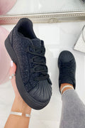 Sprankelende crystal trainers in zwart met dubbele veters en kristalversiering.